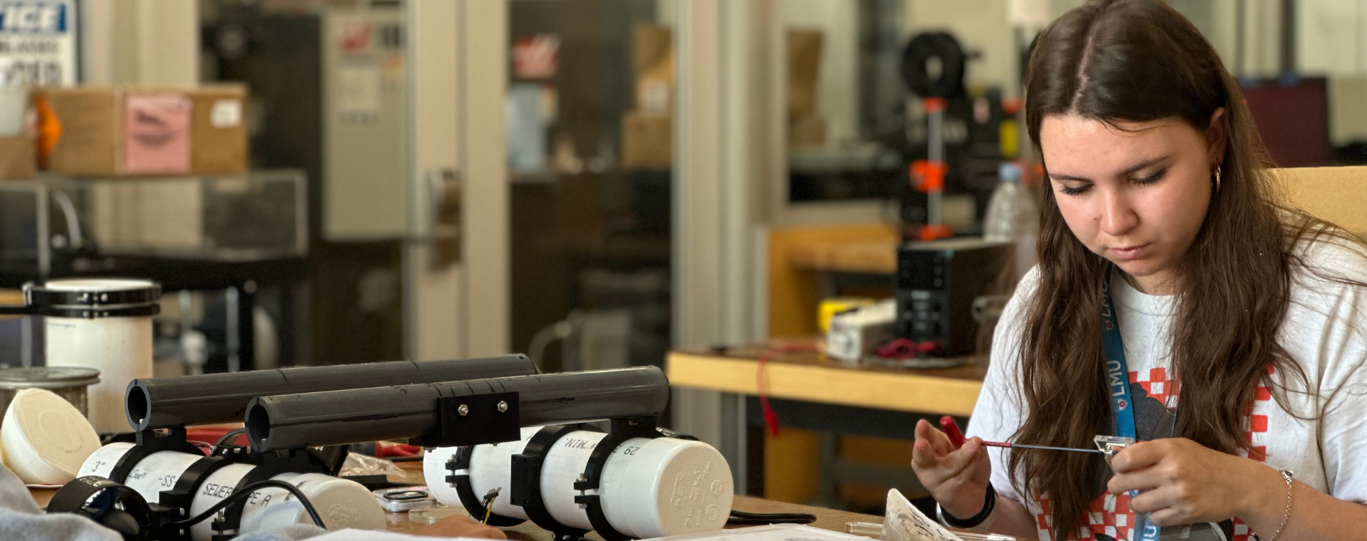 Student works on a pre-college engineering project